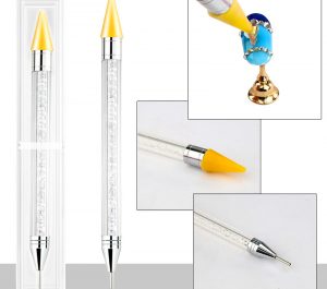 Lápiz cera para coger las piedras